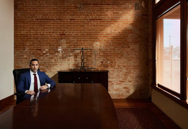 Brian Gutierrez sitting at a table