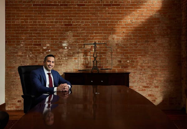 Brian Gutierrez sitting at a table