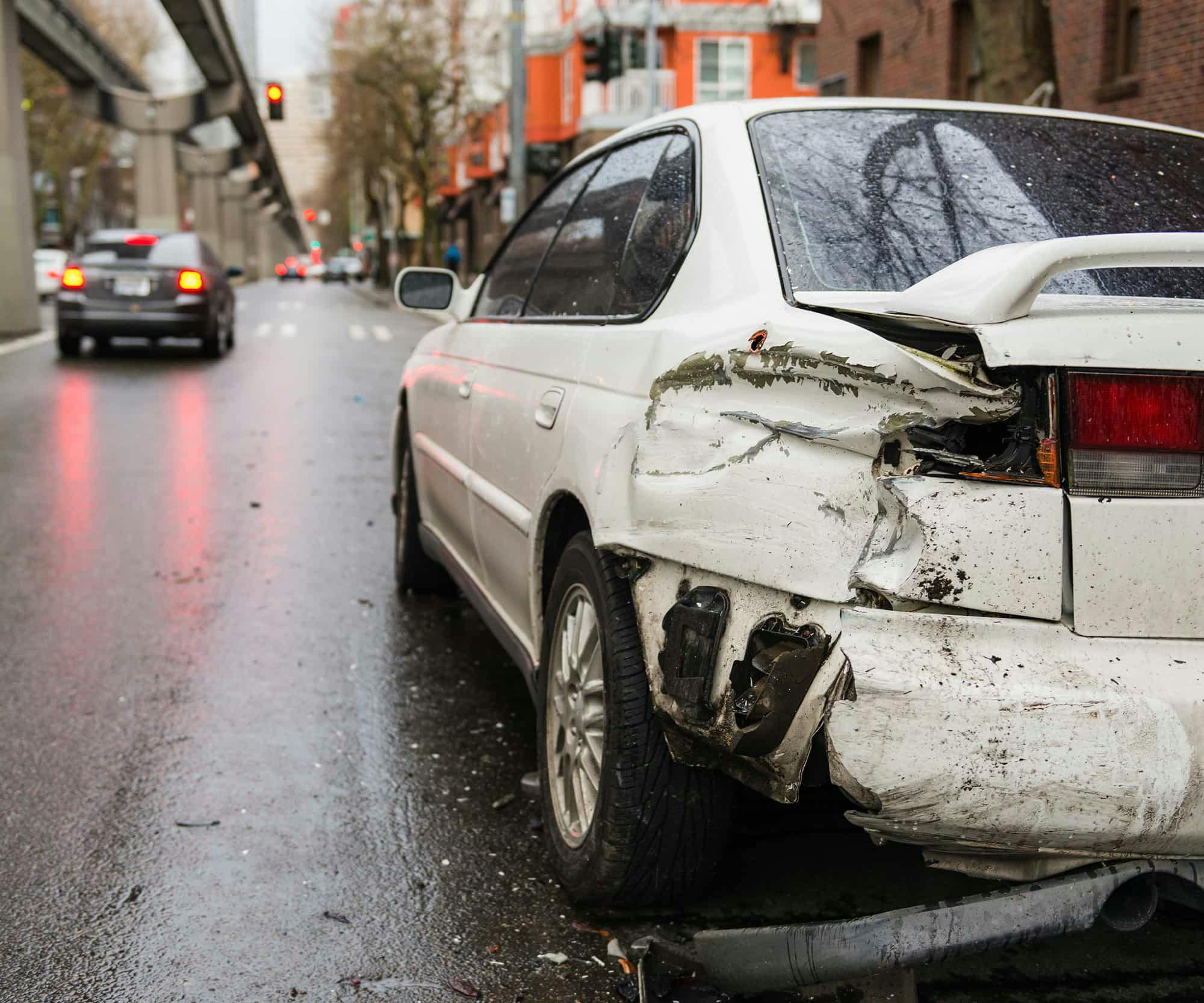 The side of a car damaged from an accident