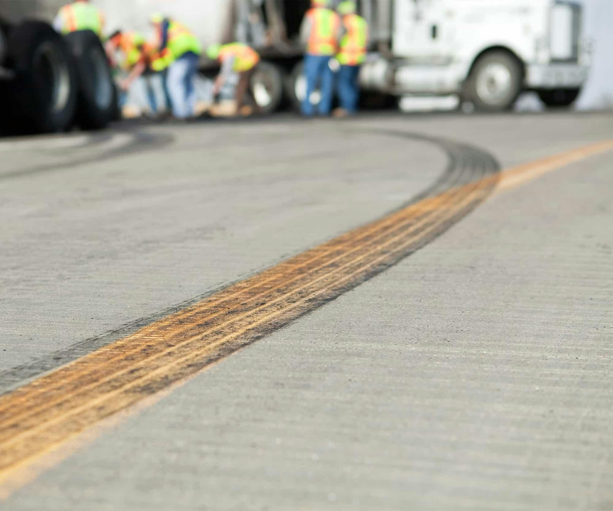 Skid marks leading to an 18-wheeler crash