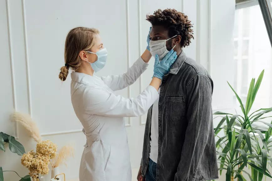 Doctor examining a patient.