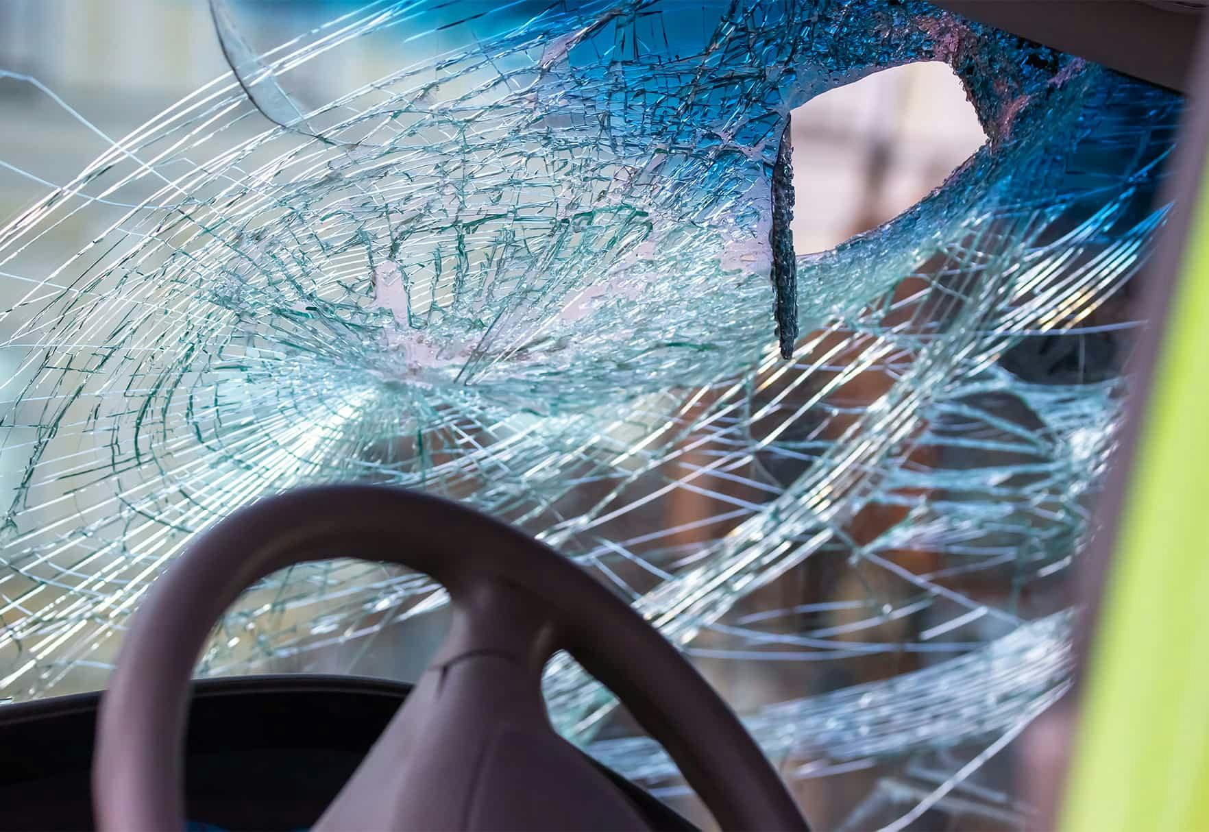 A broken car windshield
