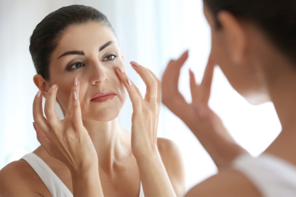 For those seeking to address loose skin and facial wrinkles, a facelift with incisions along the hairline and behind the ear can help achieve a more youthful contour.