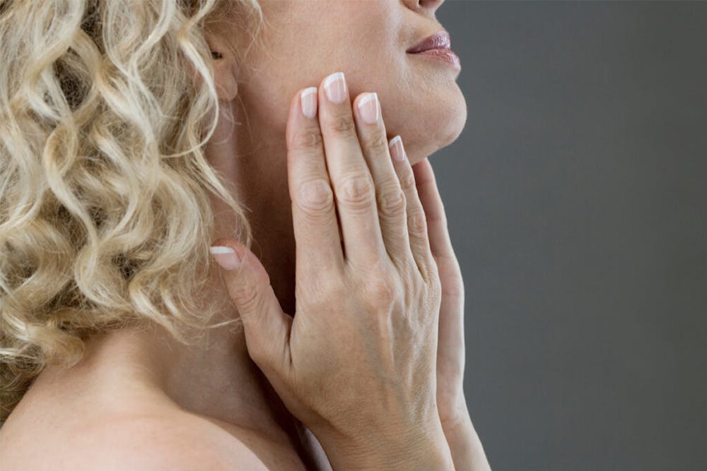 Facial aging can be addressed with a facelift procedure, which is designed to reduce the appearance of jowls and improve the contours of the lower face.