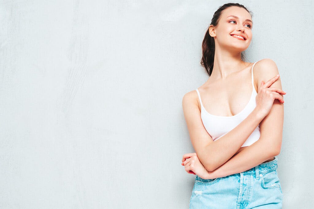 Wearing a compression garment is advised to aid in the final stages of breast reduction recovery