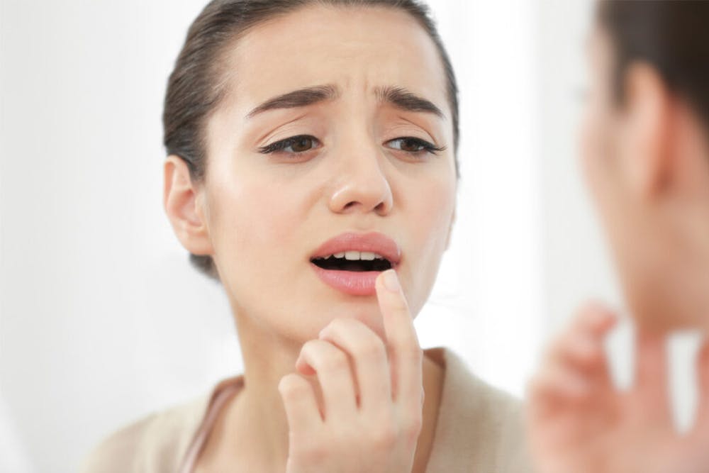 Lip reduction surgery can help address both functional and aesthetic concerns, such as drooling and an uneven facial appearance.