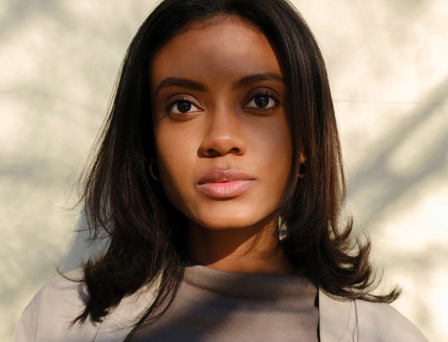 woman with dark shoulder length hair
