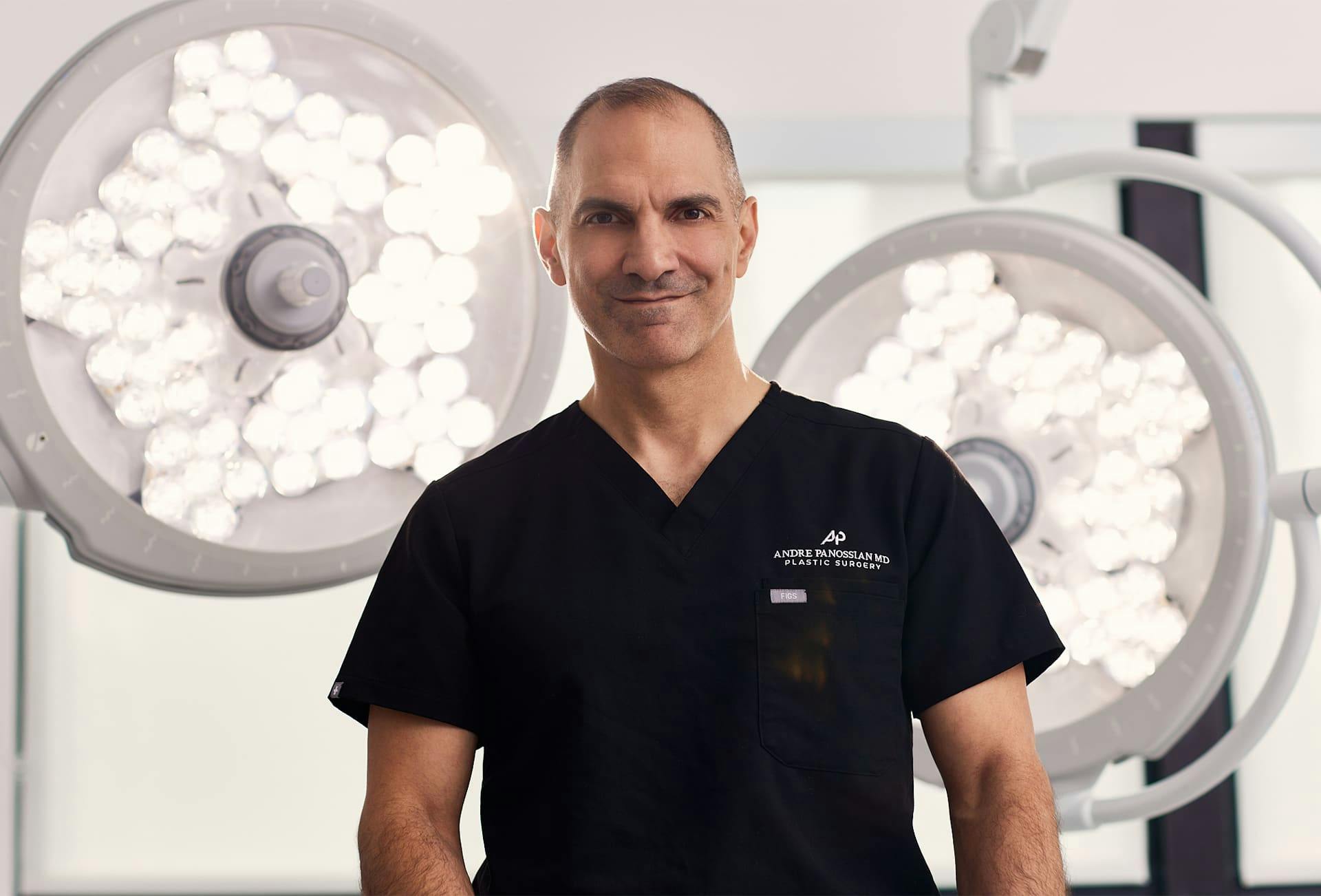 Dr. Panossian with lights behind him