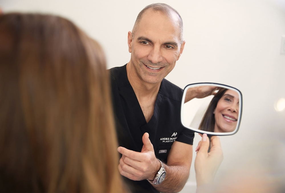 Dr. Panossian smiling at patient