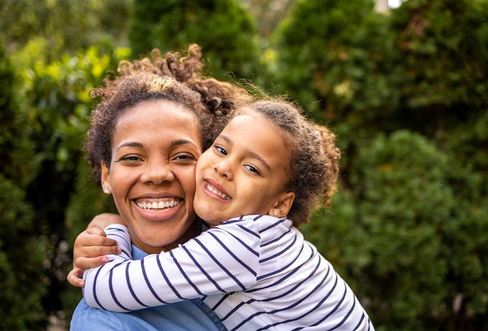 mother and daughter hugging eachother