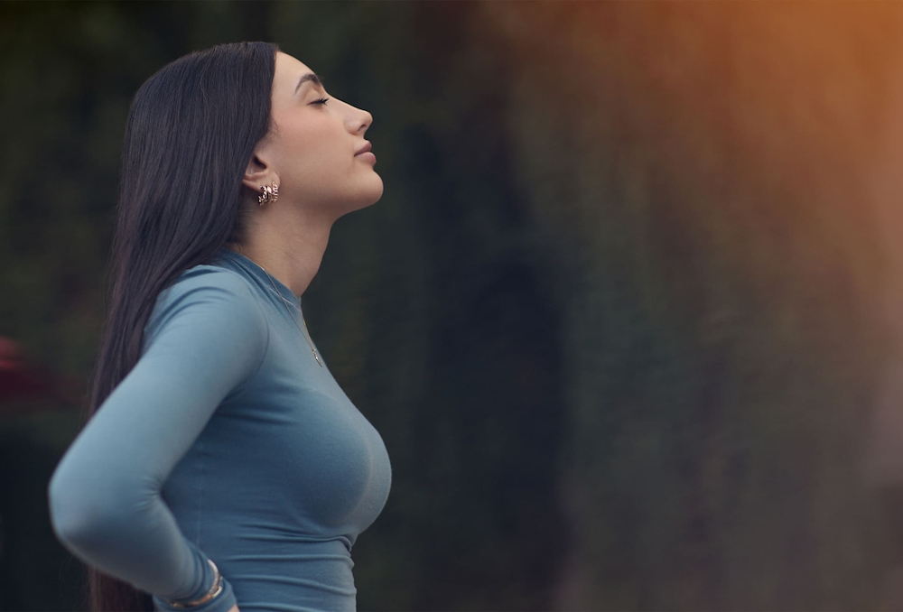 patient looking up in the air standing sideways