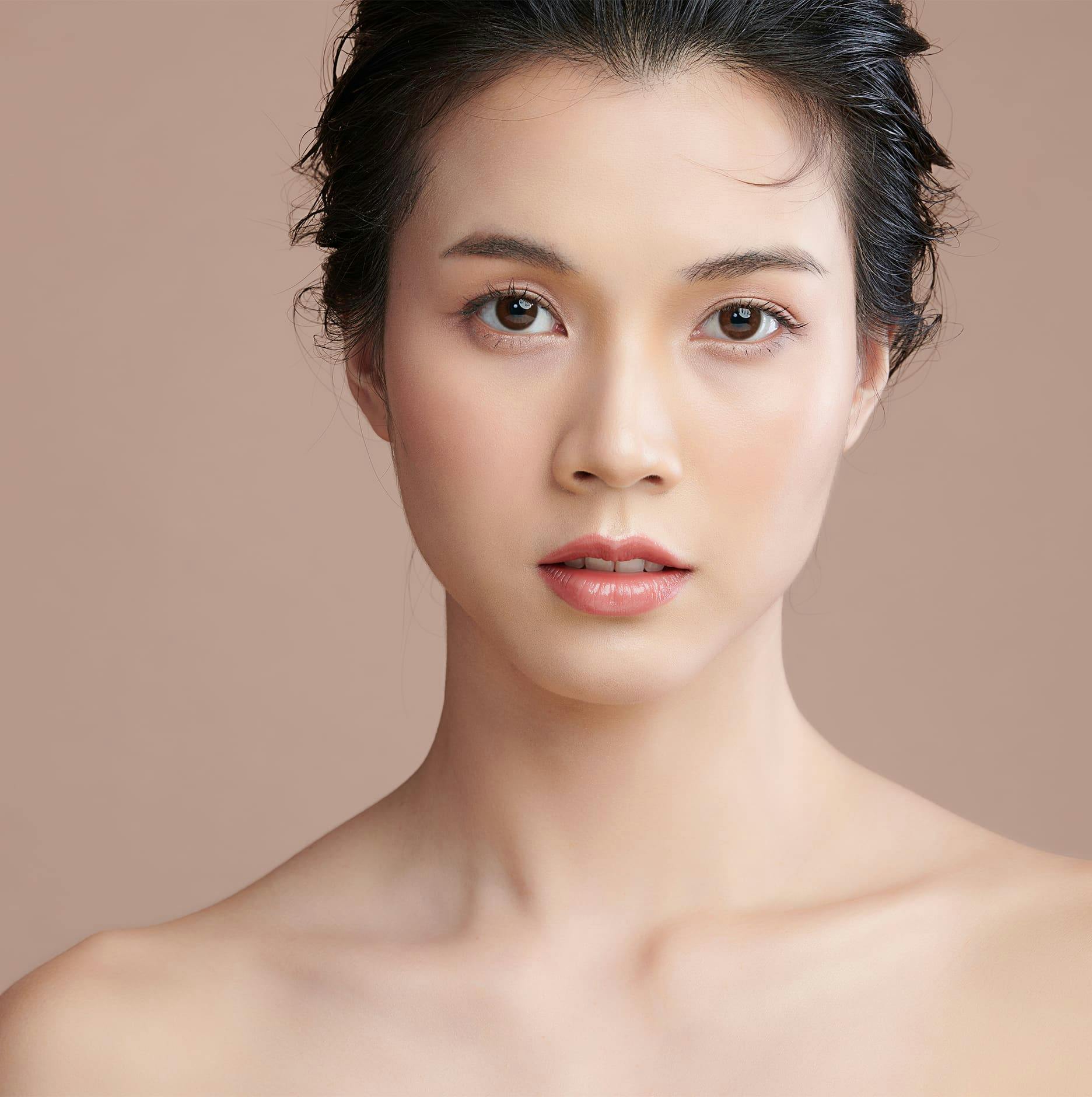 woman looking forward with hair up