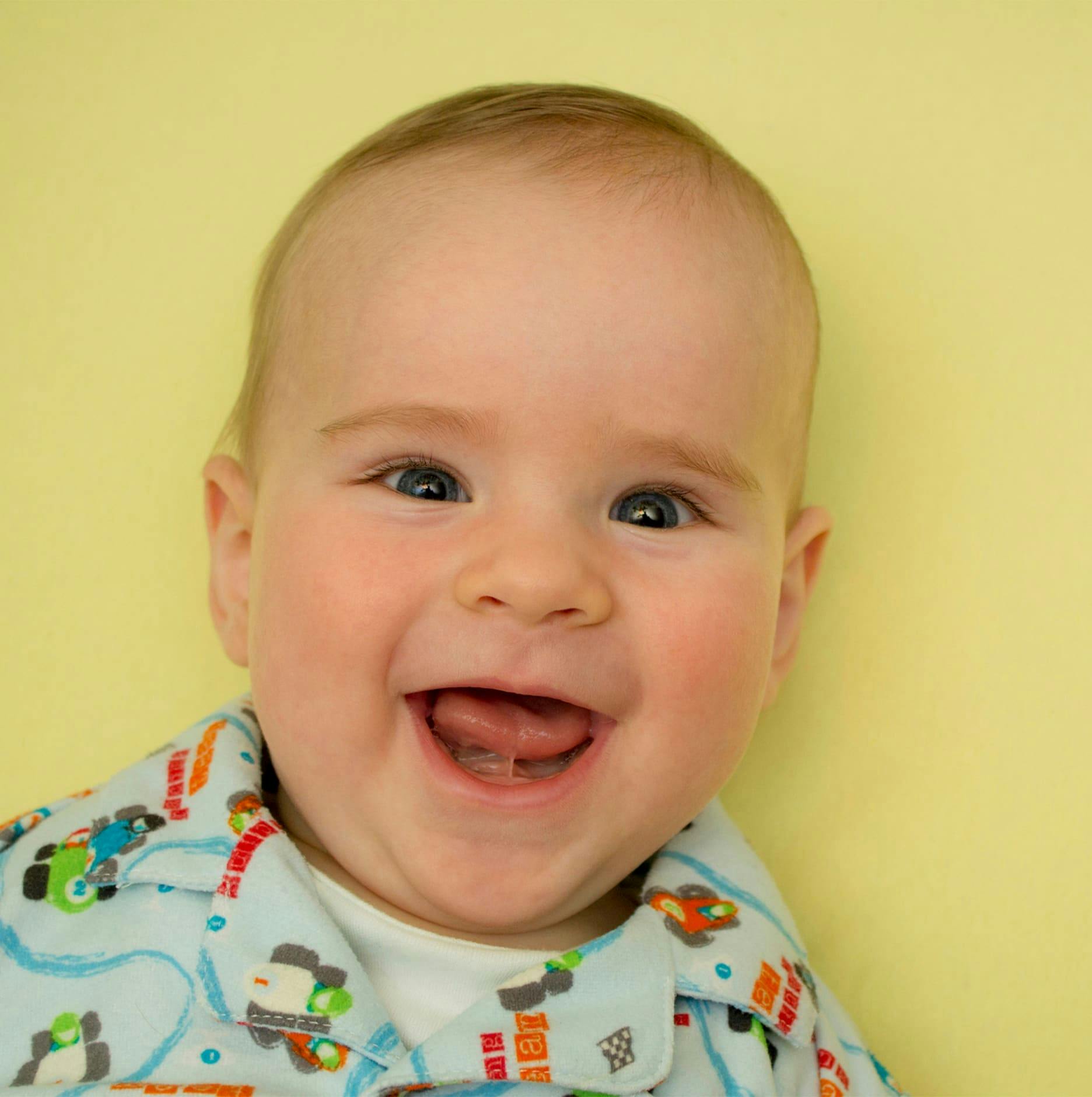 newborn baby giggling