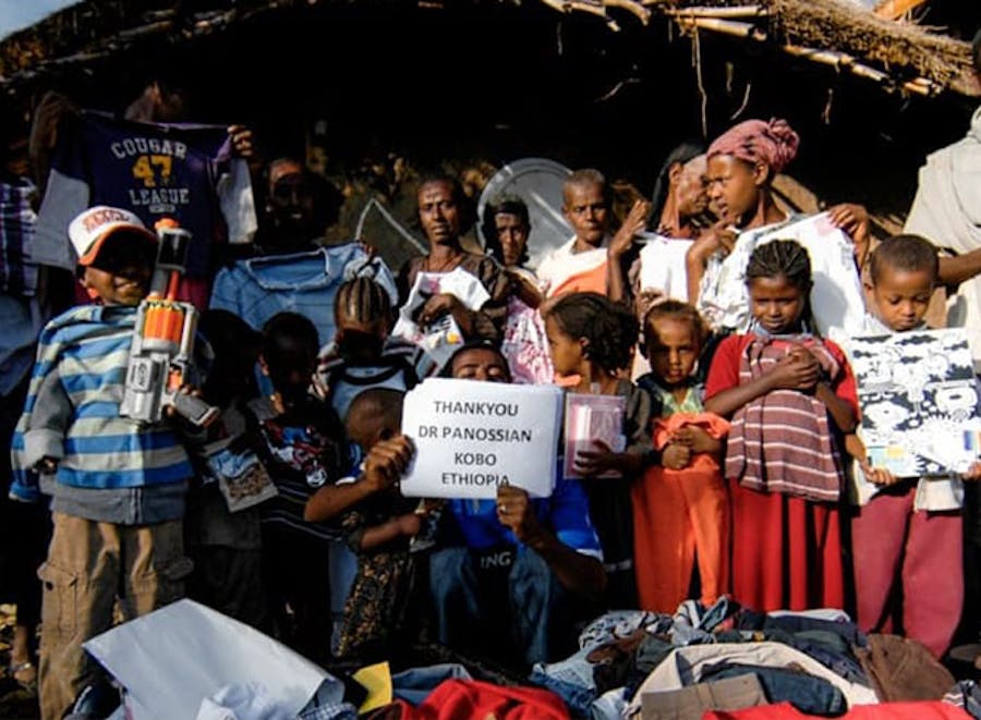 group of children saying thank you to do Dr. Panossian