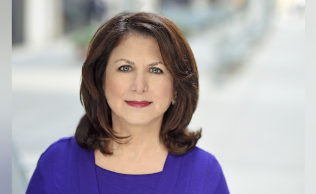 Woman standing for headshot