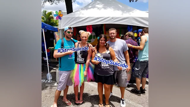 Group holding #StopSuicide signs