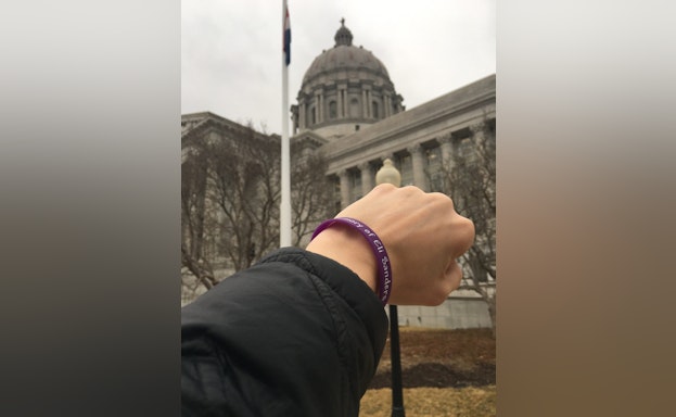 Person's wrist with wristband