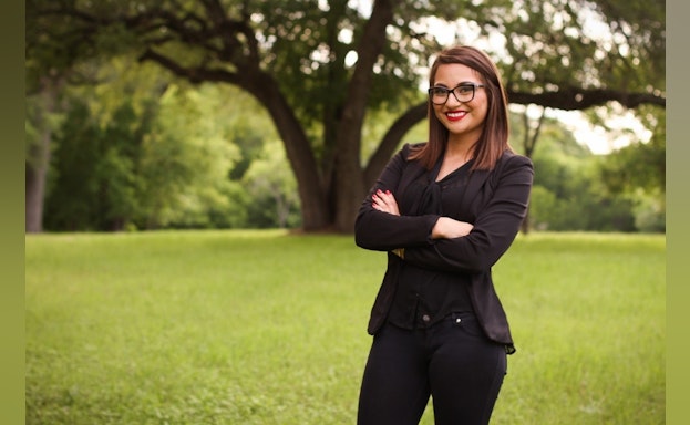 Woman standing in field