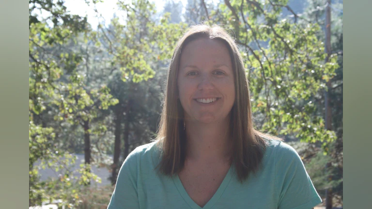 Woman smiling in forest