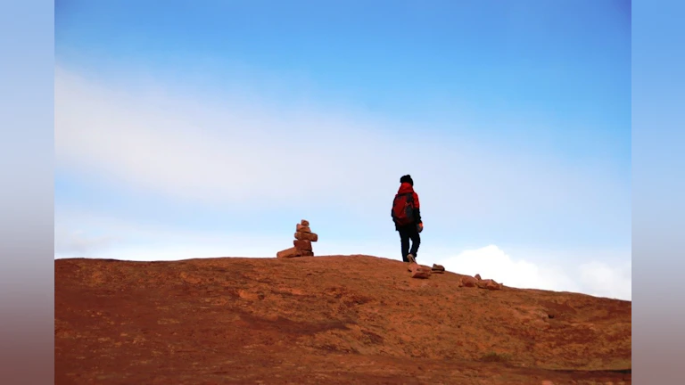 Person standing on hill