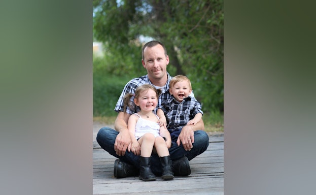 Man with two children