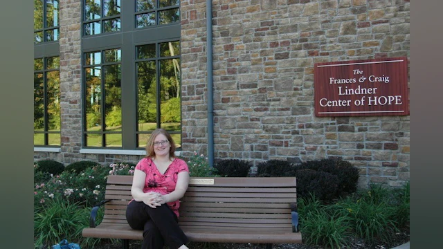 Woman sitting on bench