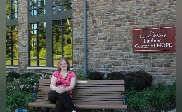 Woman sitting on bench