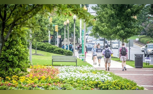 People walking on sidewalk