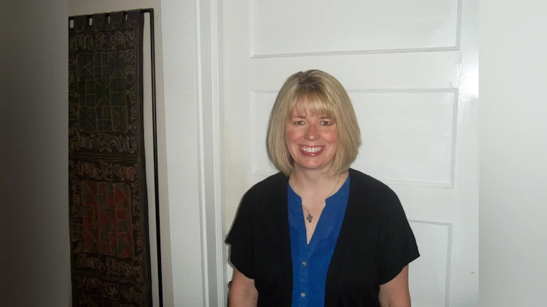 Woman standing in front of door