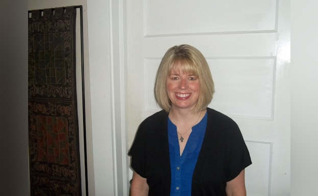 Woman standing in front of door