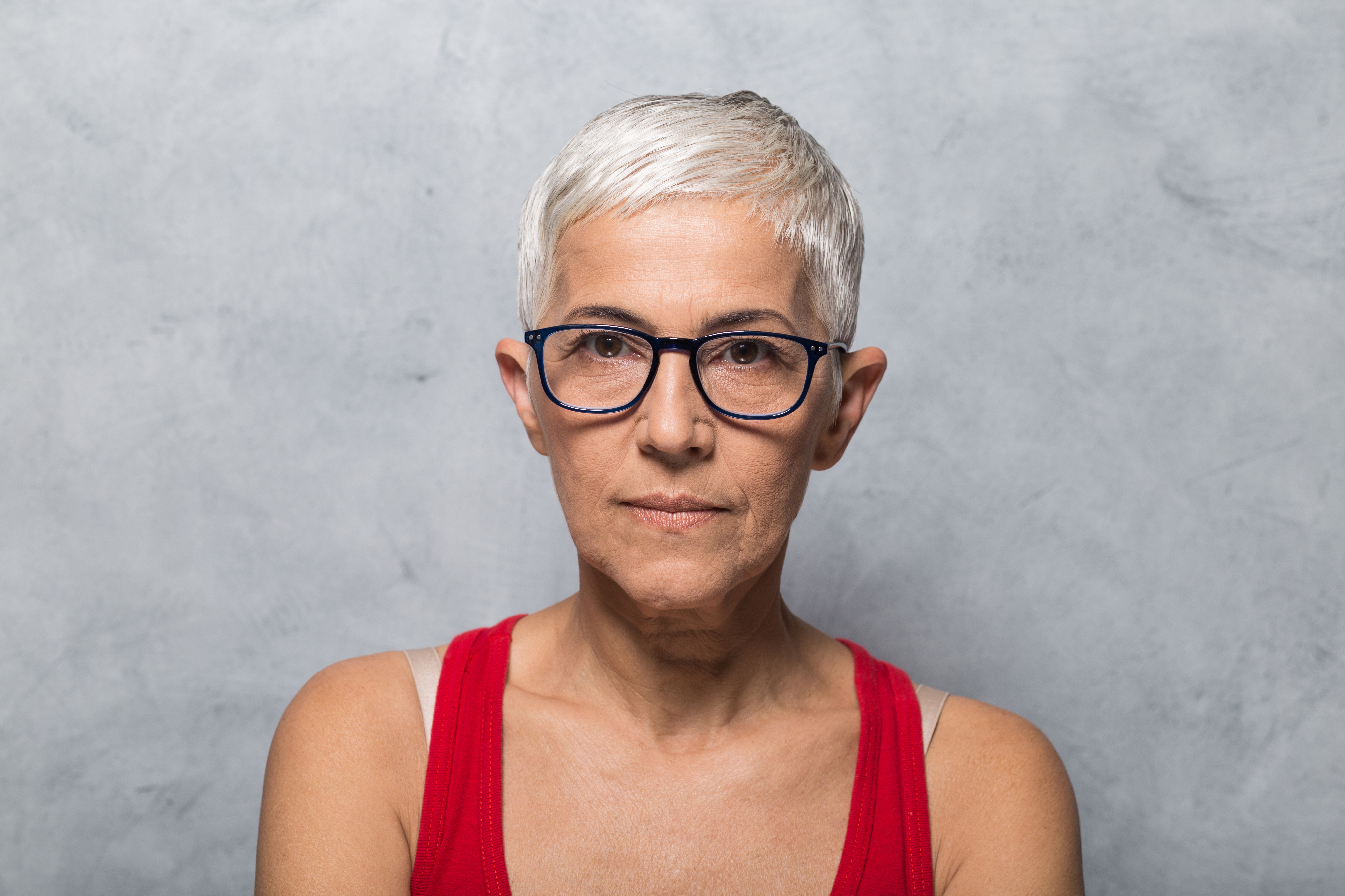 Woman in front of marble background
