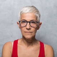 Woman in front of marble background
