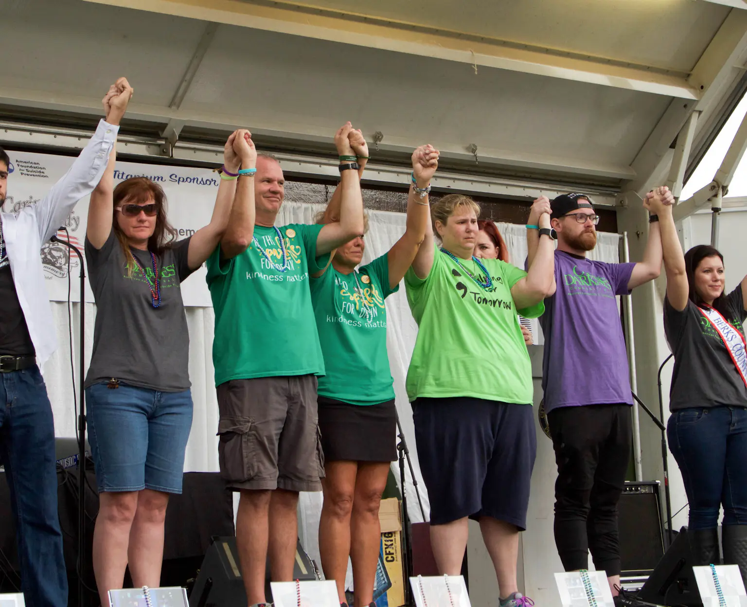 Volunteers on stage