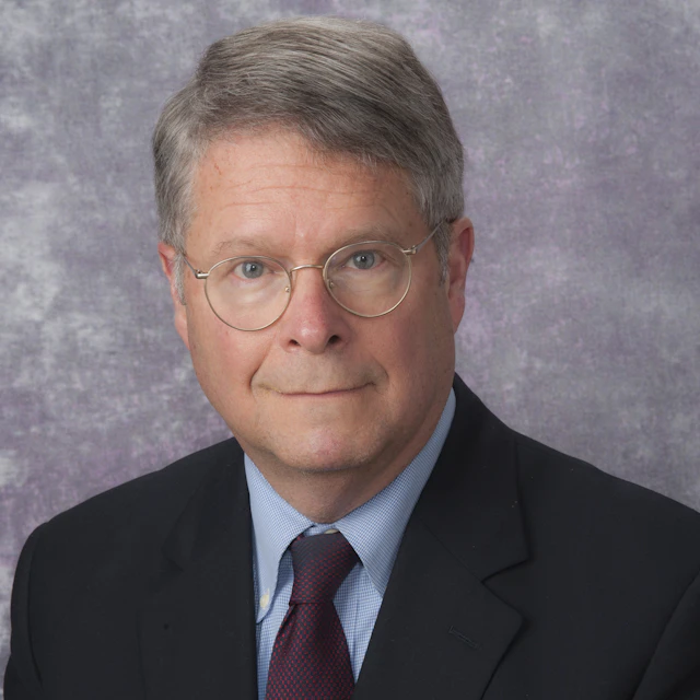 Charles Reynolds, M.D.