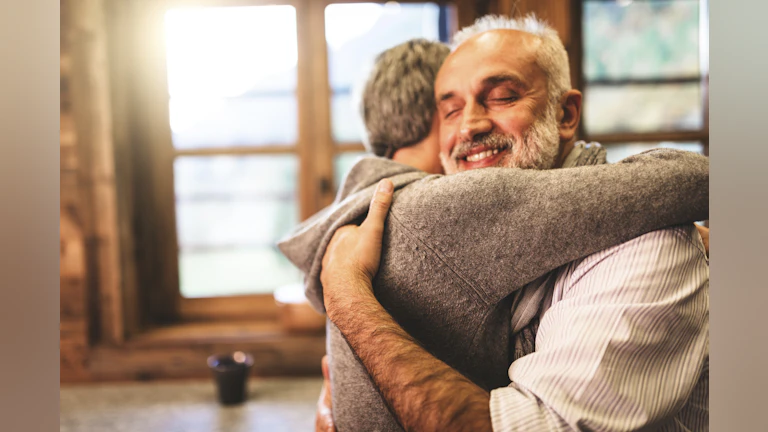 Two people hugging