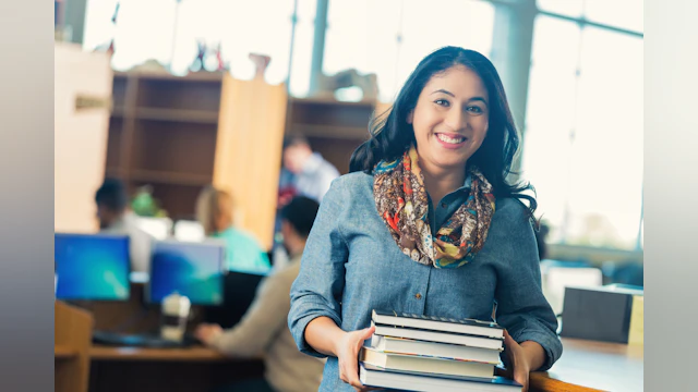 Woman holding books