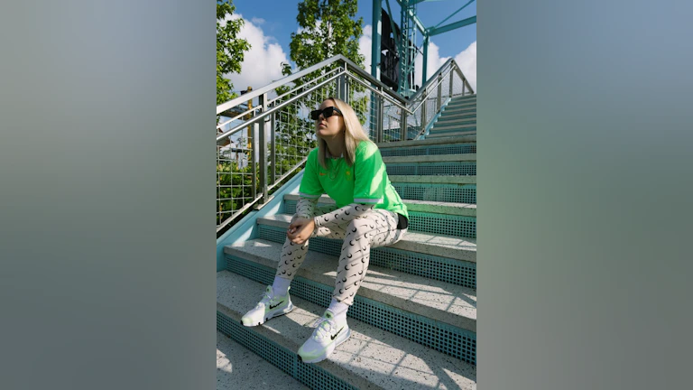 Woman sitting on steps