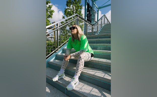 Woman sitting on steps