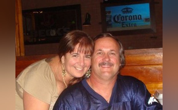 Man and woman smiling