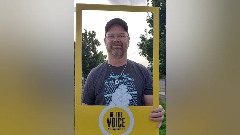 Man holding sign