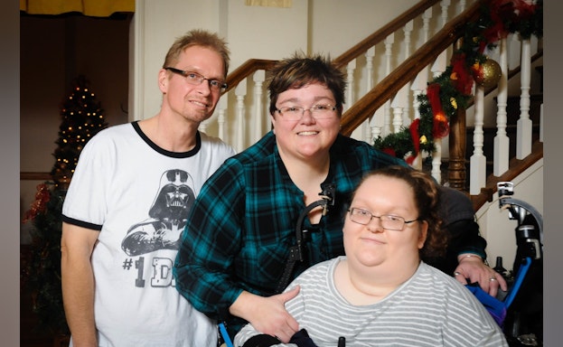 Group of people in front of stairs
