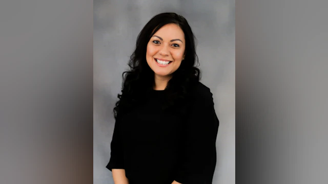Woman sitting for headshot