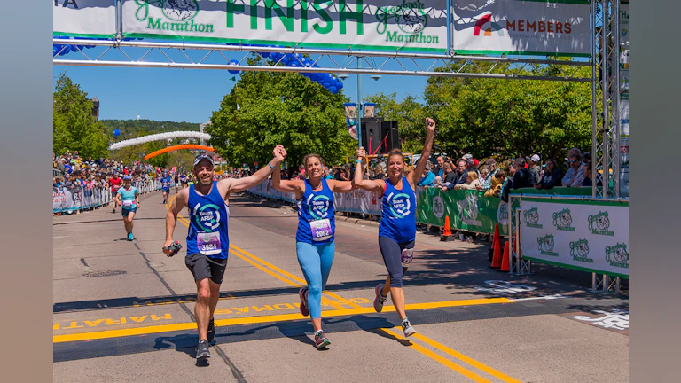 Runners crossing a finish line