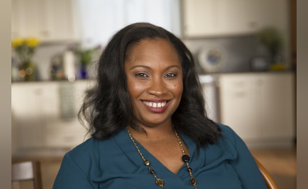 Photo of Wykisha smiling at the camera