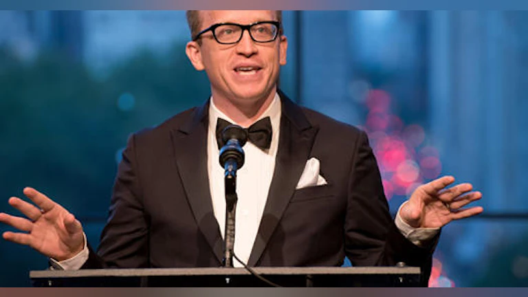 Man speaking at podium