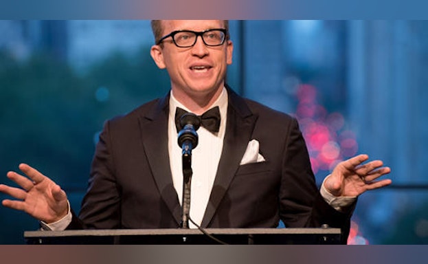 Man speaking at podium