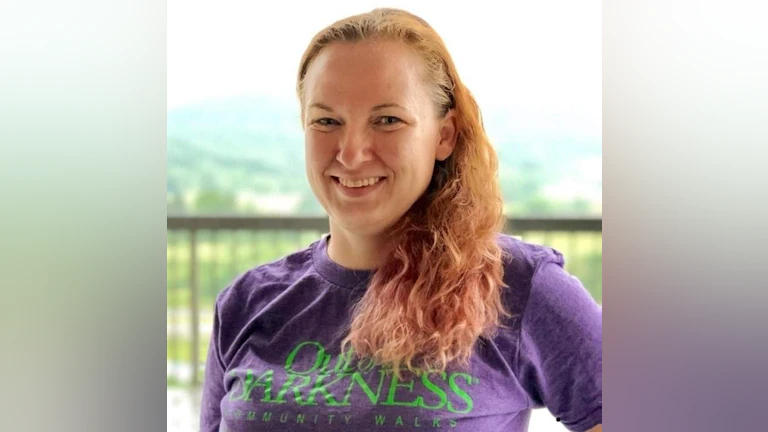 Woman smiling on balcony