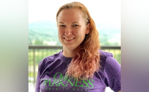 Woman smiling on balcony