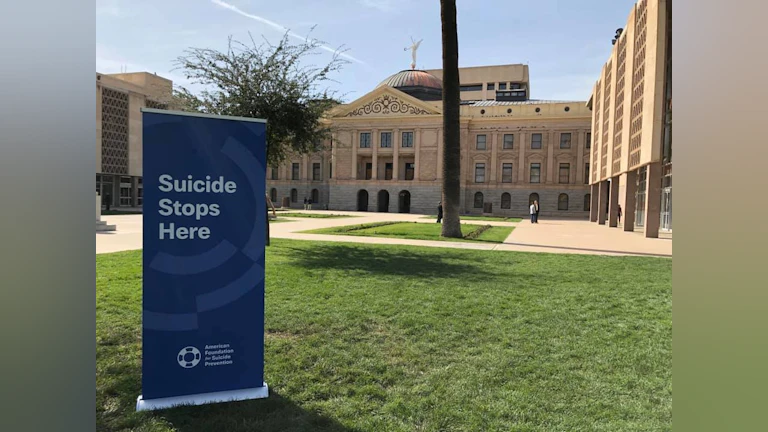 Sign in front of building