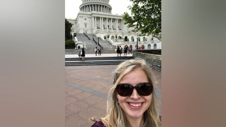 Woman in front of capitol building